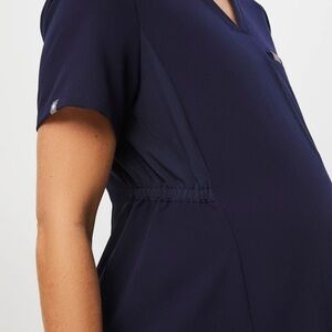 FIGS. Brand new!  Maternity scrub top Medium.  Navy.